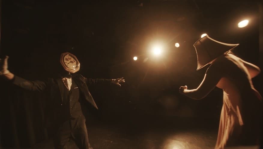 Dramatic amber-lit stage performance